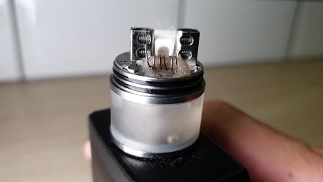 Macro-footage-of-new-clapton-coil-mounted-in-the-electronic-cigarette