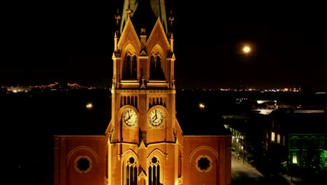 Flying-upwards-and-revealing-a-beautiful-steeple-with-a-full-moon-on-Friday-the-13th