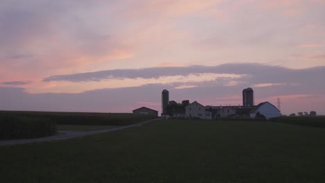 Sunrise-Over-Amish-FarmLands-with-a-Colorful-Sky-on-a-Misty-Summer-Morning-Timelapse