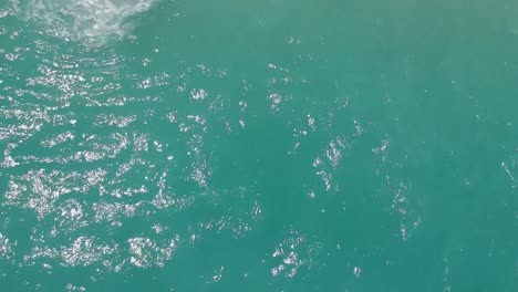 Aerial-look-down-view-of-clear-turquoise-ocean