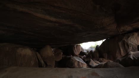 Pan-view-of-abandoned-scary-rock-cave