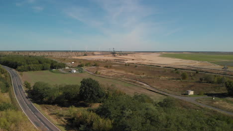 Countryside-industrial-development-site,-agricultural-land,-aerial-view
