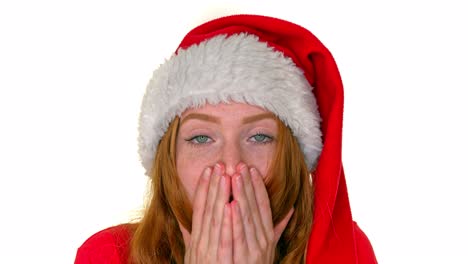 Amazed-red-head-woman-in-santa-hat