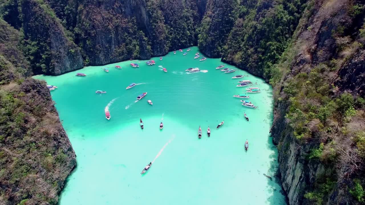Premium Stock Video Aerial View Of Iconic Tropical Turquoise Water Pileh Lagoon Surrounded By