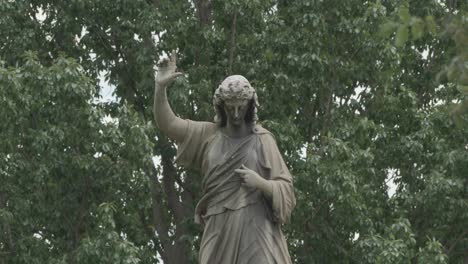 Statue-in-Woodland-cemetery,-Philadelphia,-PA