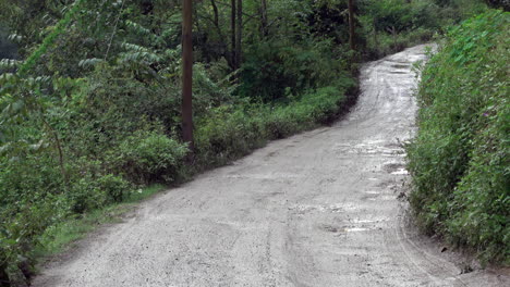 A-muddy-mountain-road-in-the-foothills-of-the-Himalayas