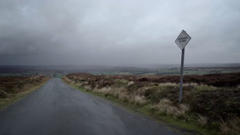 Road-sign-indicating-a-Passing-Place,-on-a-single-track-road-over-the-North-York-Moors