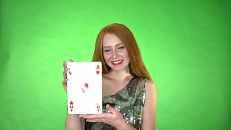 Sexy-redhead-woman-holding-ace-card