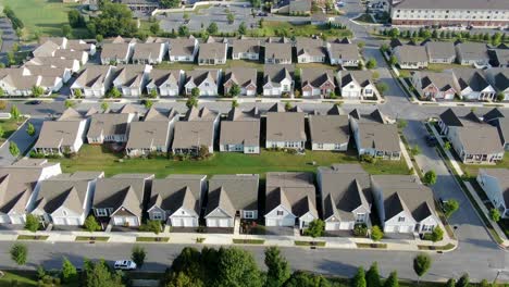 Aerial-drone-shot-of-identical-cookie-cutter-homes-in-suburban-community-in-Lancaster-County,-Pennsylvania,-USA,-growth-and-suburban-sprawl-theme