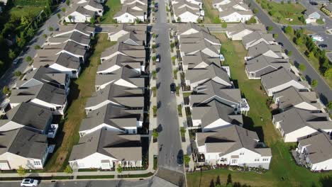 Slow-aerial-tilt-up-reveals-community-of-similar-homes-in-neighborhood-community-in-Lancaster-County-Pennsylvania