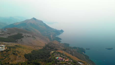 AERIAL-DOLLY-IN:-drone-flying-above-the-most-amazing-coast-of-South-of-Italy,-in-between-sea-and-mountains-in-the-Basilicata-region