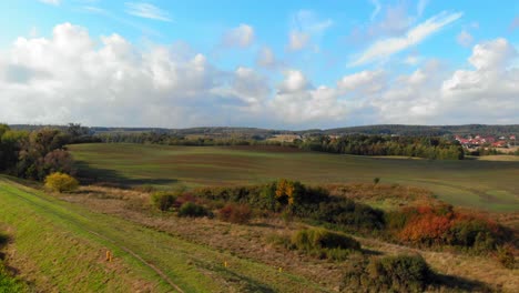 Aerial-dolly-shot-of-field-in-Kolbudy,-pomeranian-district-in-Poland