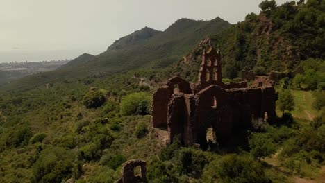 Drone-shot-orbiting-around-old-monastery-Carmelitano-at-Desierto-de-las-Palmas