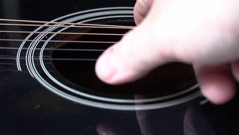 Guitar-String-vibrating-in-slow-motion,--Close-up