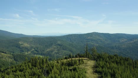 Aerial-view-of-forested-Beskid-Mountains-in-Poland,-mountain-range-in-the-Carpathians