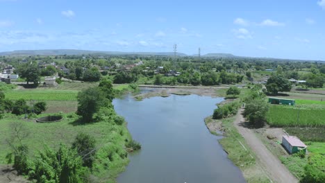 Aerial-view-Indian-Rural-Village-at-the-beautiful-river-bank