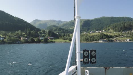 Norwegian-ferry-driving-on-fjord-from-Volda-to-Lauvstad,-Norway