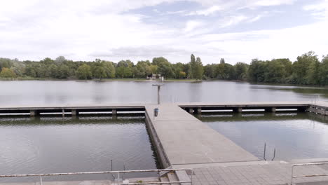 Woog-lake,-daylight-with-reflection,-Darmstadt-outdoor-pool,-hessen,-germany