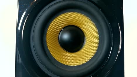 A-vibrating-membrane-on-Isolated-high-performance-black-and-golden-audio-speaker,-Part-7,-STILL