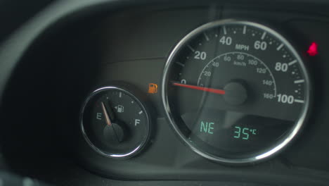 Fuel-gauge-on-a-dashboard-of-a-car-reads-as-empty