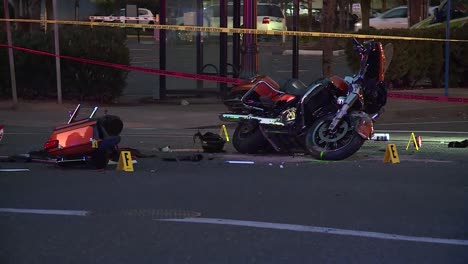 Aftermath-of-motorcycle-crash-with-pieces-of-bike-all-over-road