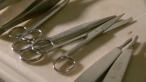 Scissors-and-embalming-tools-on-a-table