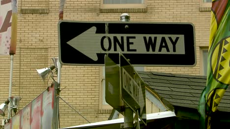 A-close-up-of-a-One-Way-sign-in-the-city