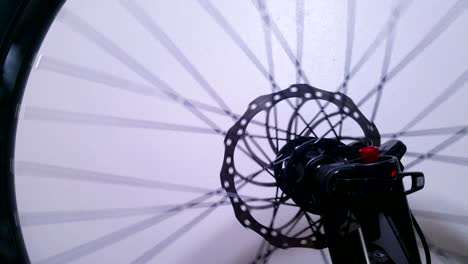 Fast-spinning-mountain-bicycle-with-disc-brake-and-big-tires