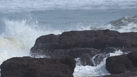 Sea-waves-hitting-the-rock-in-slow-motion-at-sunset
