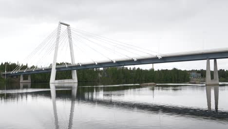 Long-shot-of-cars-going-over-cable-bridge-in-Umeå,-Sweden