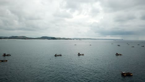 AERIAL-4K-Rising-Shot-Lobster-Traps-in-Lombok-Indonesia-Ocean