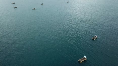 AERIAL-4K-Panning-Shot-Lobster-Traps-in-Lombok-Indonesia-Ocean