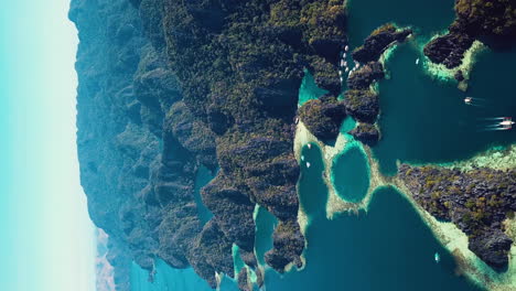 Vertical,-Tropical-Paradise-Aerial,-Philippines,-Twin-Lagoon-and-Coral-Reefs-on-Coron-Island