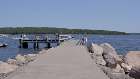 First-person-view-walking-onto-a-dock-at-the-lake