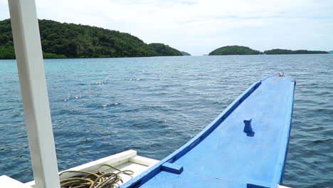 Slow-Motion-Riding-In-Front-Of-A-Passenger-Boat-In-Coron-Palawan