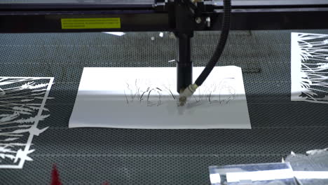 laser-cutting-machine-working-on-board