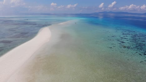 4K-aerial-fly-over-of-sandbar-near-secluded-islands-of-Balabac-Palawan-Philippines