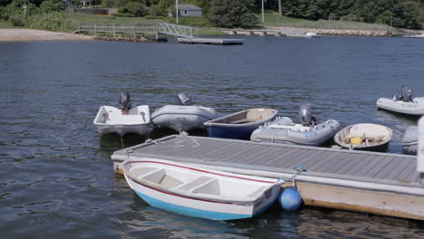 small-boats-docked-at-the-lake-in-gentle-waves