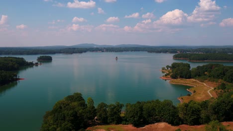 Droning-over-Lake-Lanier-in-Georgia-with-mountains-in-the-background