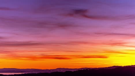 4k-time-lapse-of-sunset-over-Gibraltar-and-Marbella,-orange-purple-sunset-over-the-Costa-del-sol,-motion-timelapse-shot-on-a-gimbal