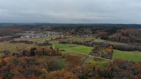Aerial-footage-across-housing,-forests-and-fields-near-Kallered,-Molndal,-Gothenberg,-Sweden
