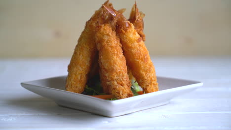 batter-fried-prawns-on-white-plate