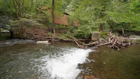 Waterfall-near-Covered-Bridge,-Thomas-Mill-at-the-Wissahickon-Creek