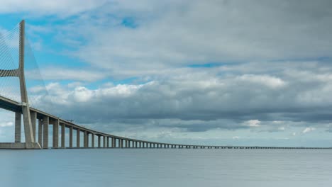 Timelapse-of-the-Vasco-da-Gama-bridge-in-Lisbon,-Portugal-on-a-cloudy-day