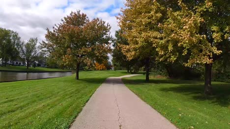 Walking-Hyperlapse-in-park-during-autumn-4K---Bike-path