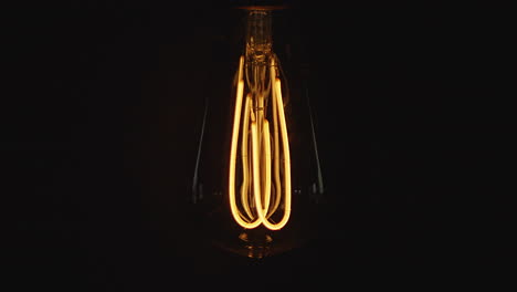 Vintage-lightbulb-dimming-on-and-off