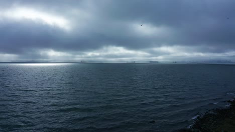 A-cloudy-day-with-the-bay-and-sky-and-sunbeams