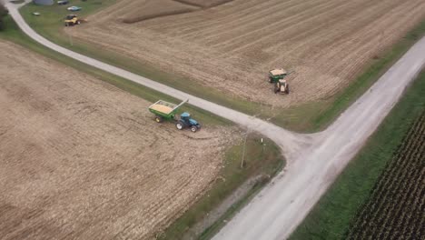 Drone-flyover-of-a-green-cornfield-towards-a-harvested-cornfield