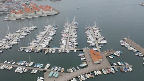 Drone-flight-over-a-yacht-harbour-in-Marstrand-Sweden