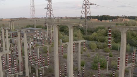 Electricity-pylons-at-a-decommissioned-Nuclear-substation-with-overgrown-surroundings